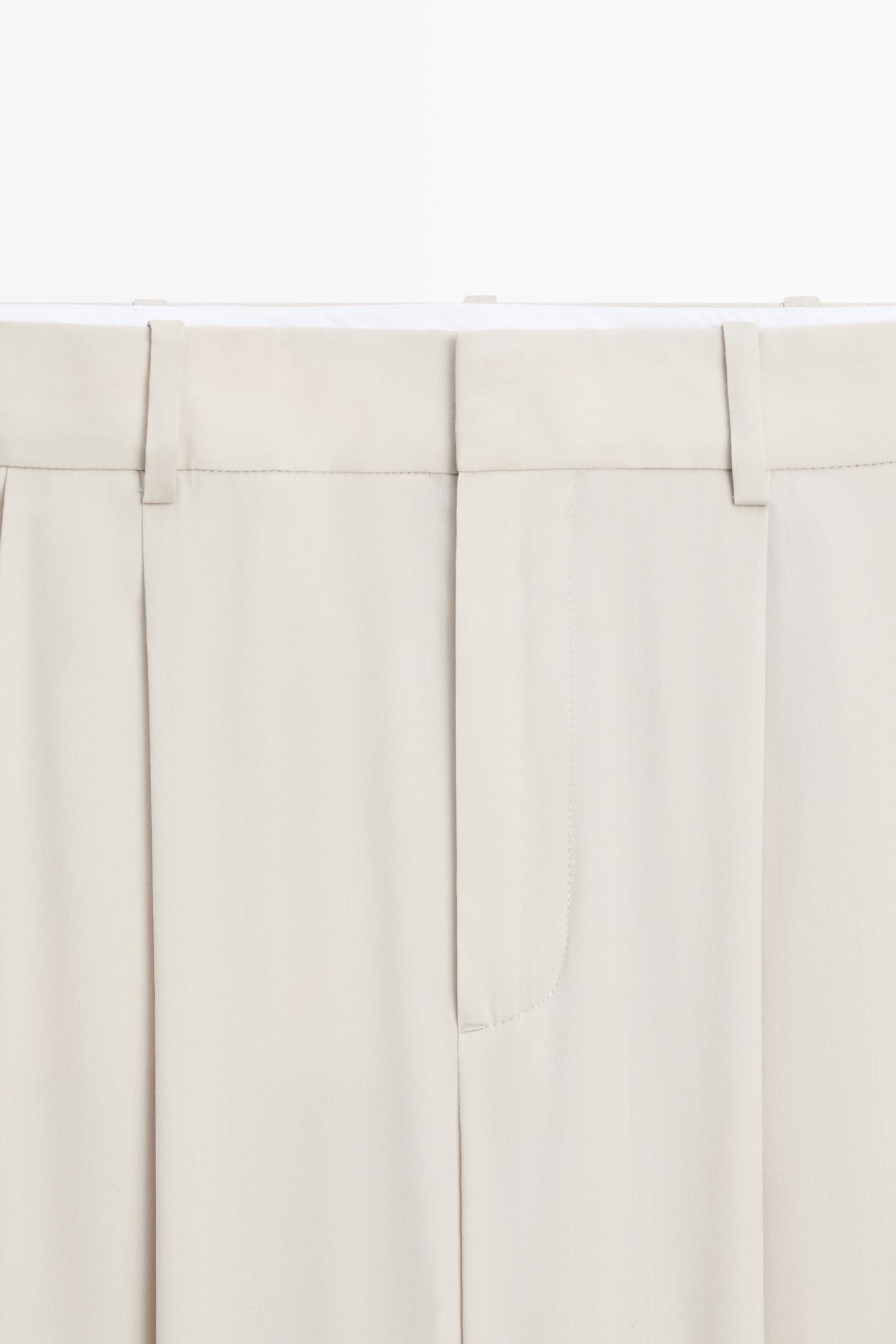 PANTALON EN LAINE MÉLANGÉE À PINCES ET BOUTONS