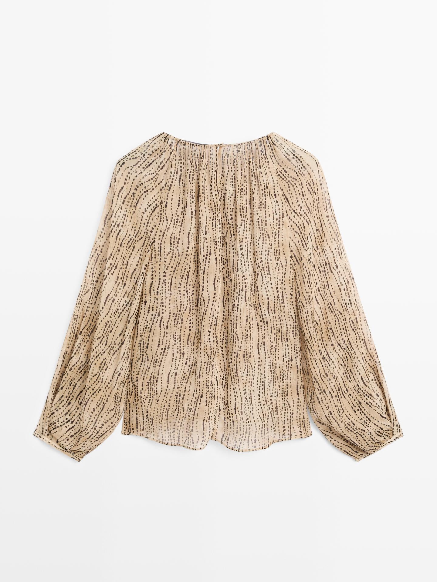 BLOUSE DRAPÉE SEMI-TRANSPARENTE