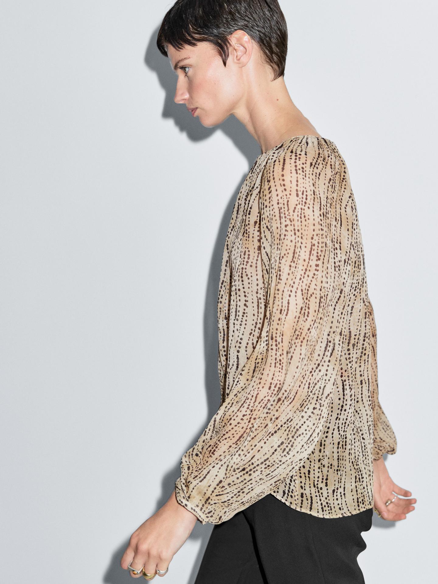 BLOUSE DRAPÉE SEMI-TRANSPARENTE
