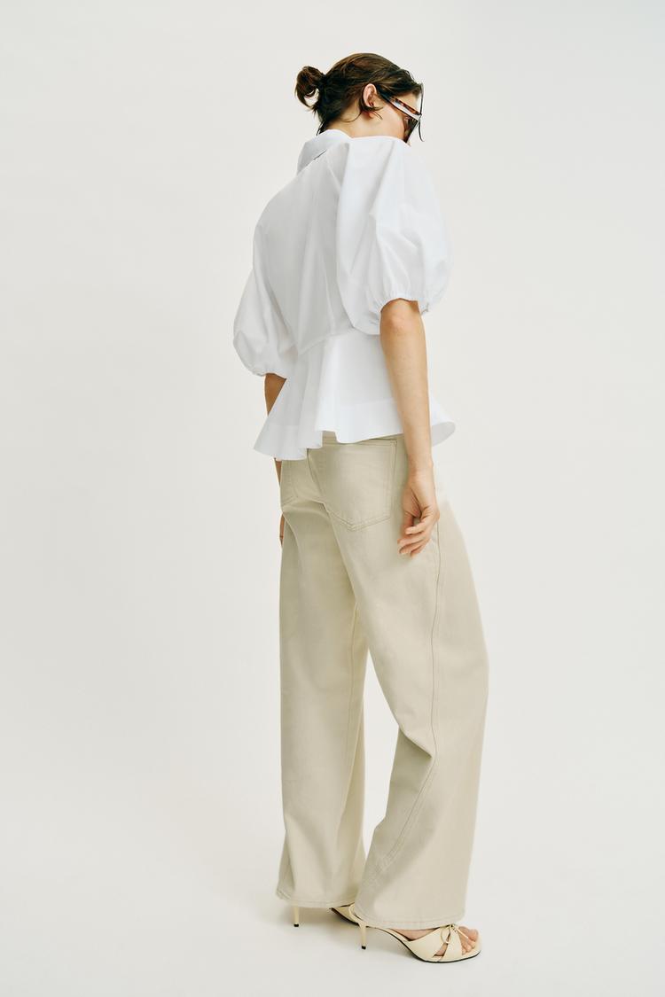 CHEMISE PÉPLUM À MANCHES BOUFFANTES