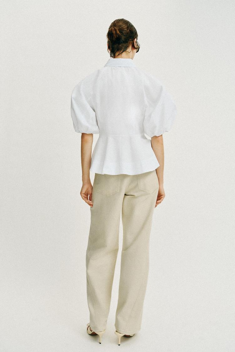 CHEMISE PÉPLUM À MANCHES BOUFFANTES