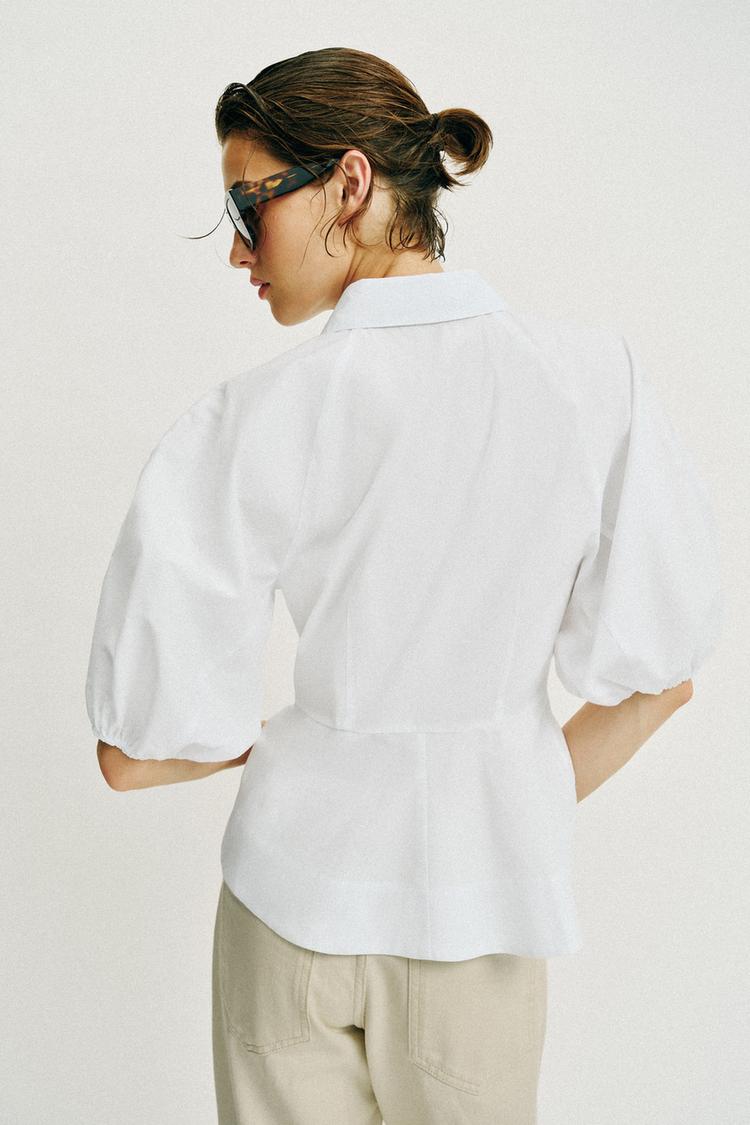 CHEMISE PÉPLUM À MANCHES BOUFFANTES