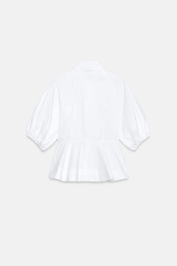 CHEMISE PÉPLUM À MANCHES BOUFFANTES