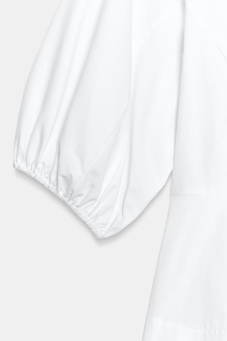 CHEMISE PÉPLUM À MANCHES BOUFFANTES