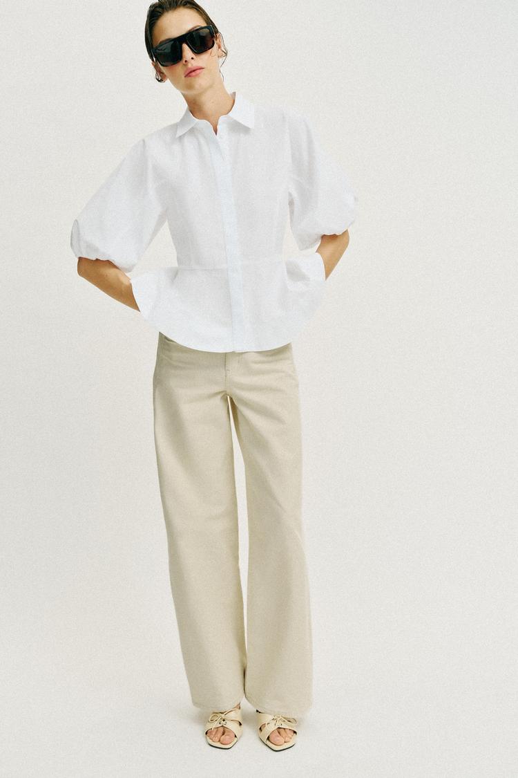 CHEMISE PÉPLUM À MANCHES BOUFFANTES