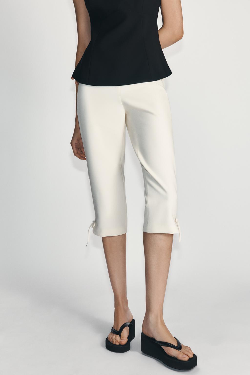 CAPRI TROUSERS WITH BOW HEM