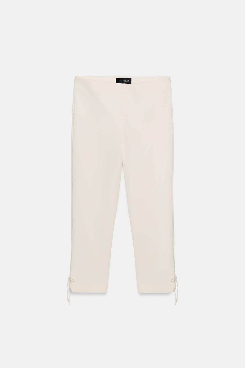 CAPRI TROUSERS WITH BOW HEM