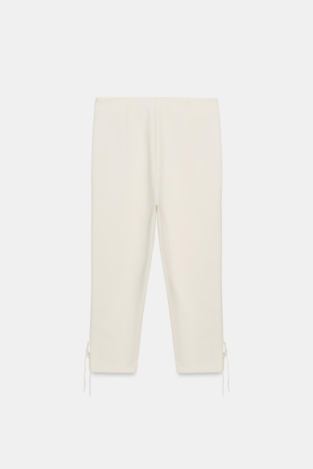CAPRI TROUSERS WITH BOW HEM