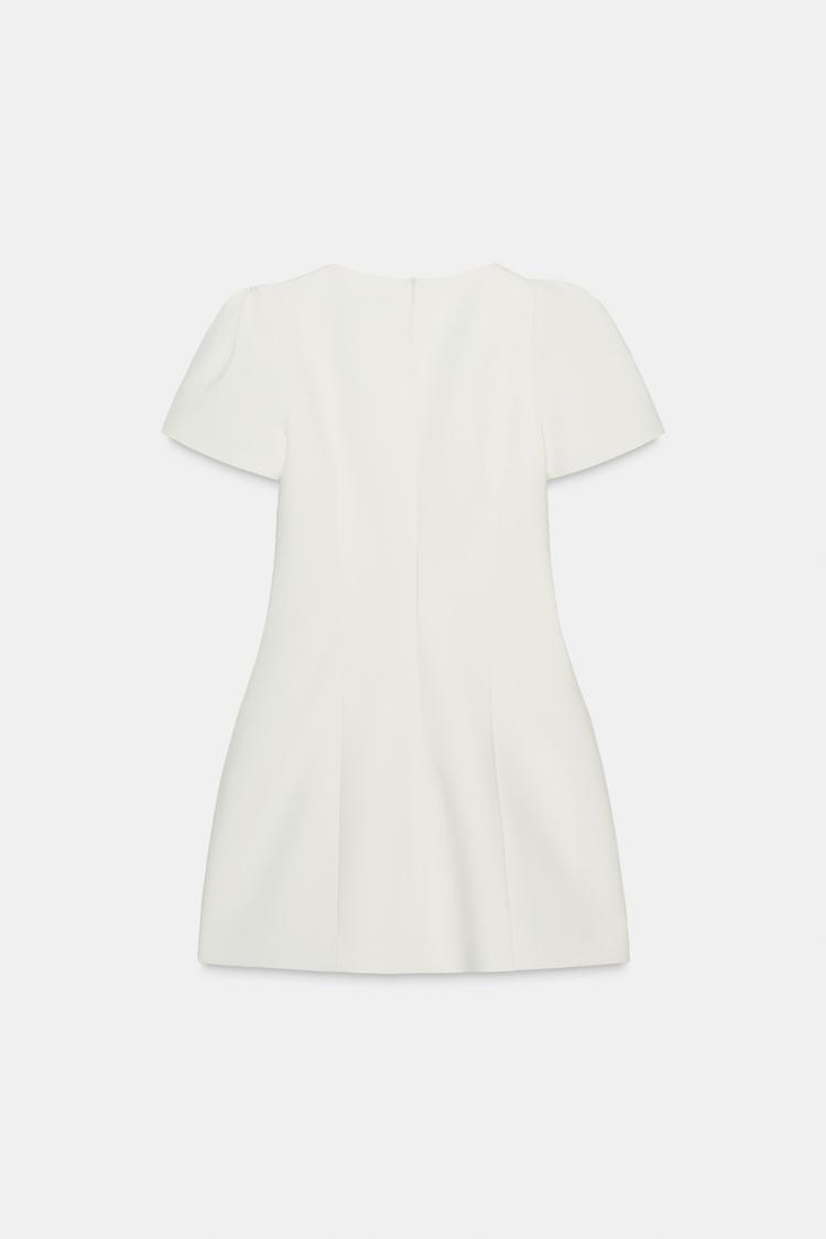 ROBE COURTE PLIS POCHE