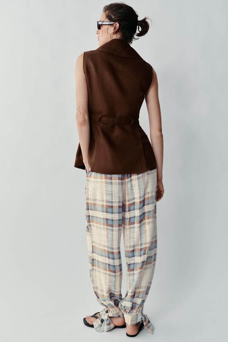 PANTALON BOUFFANT À LACETS ET CARREAUX