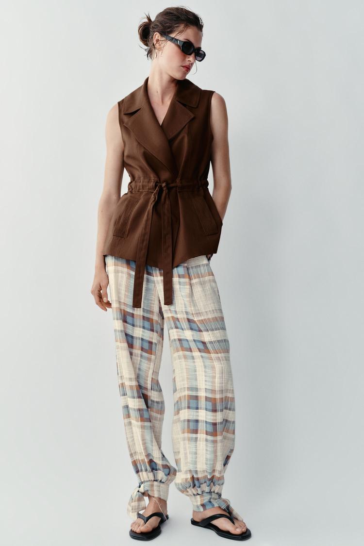 PANTALON BOUFFANT À LACETS ET CARREAUX