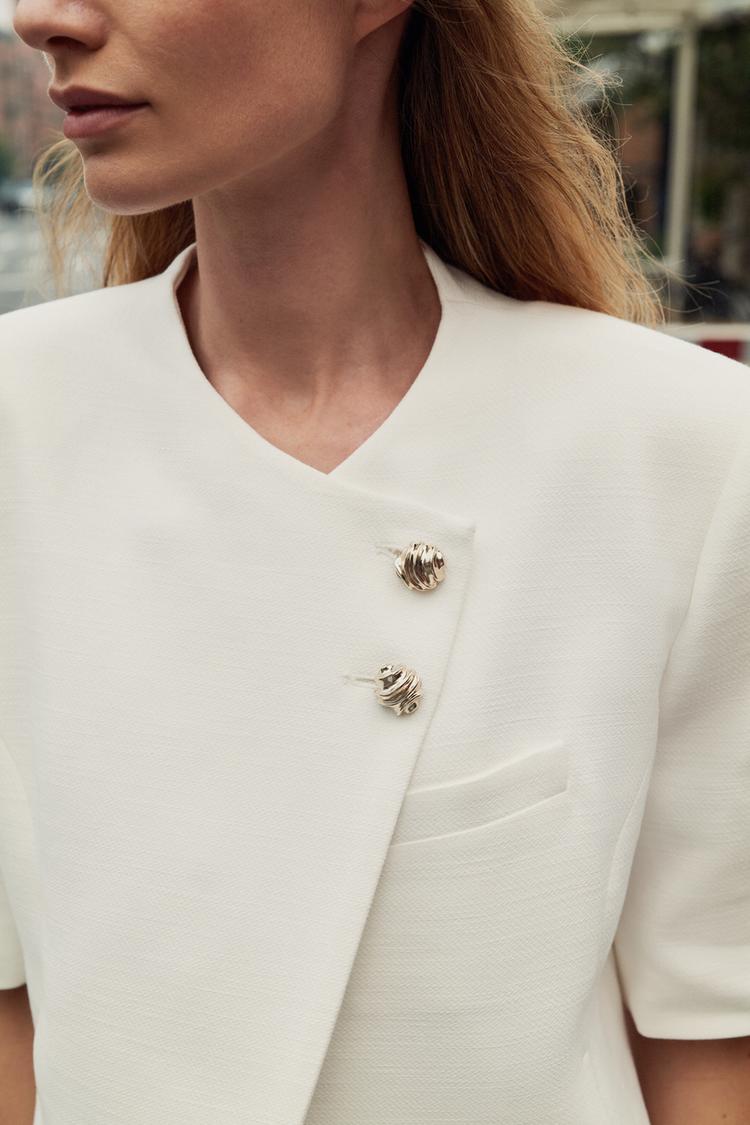 VESTE À MANCHES COURTES ET ÉPAULETTES