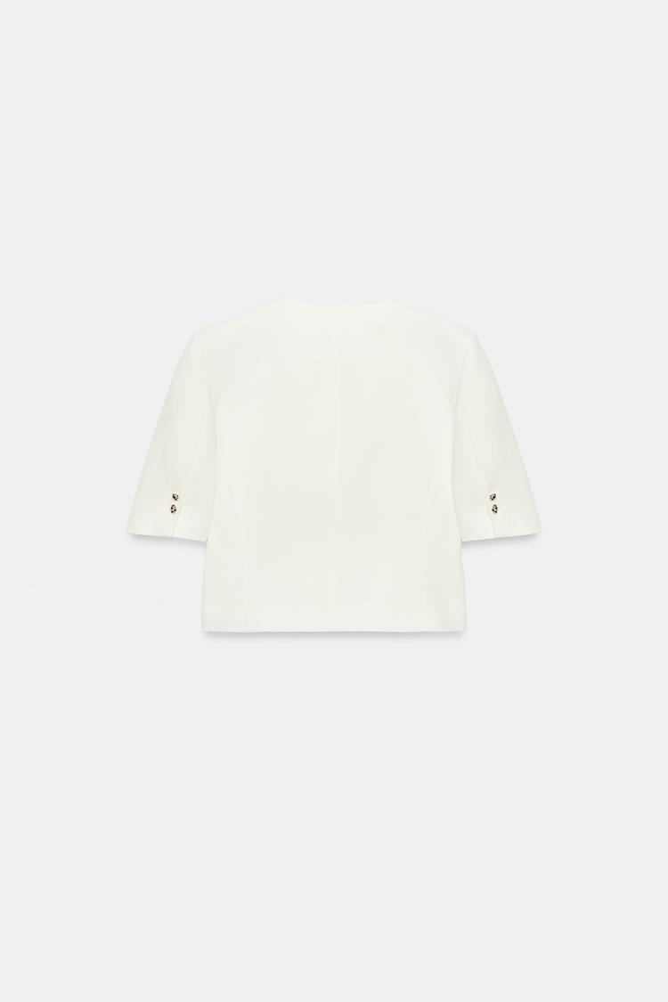 VESTE À MANCHES COURTES ET ÉPAULETTES