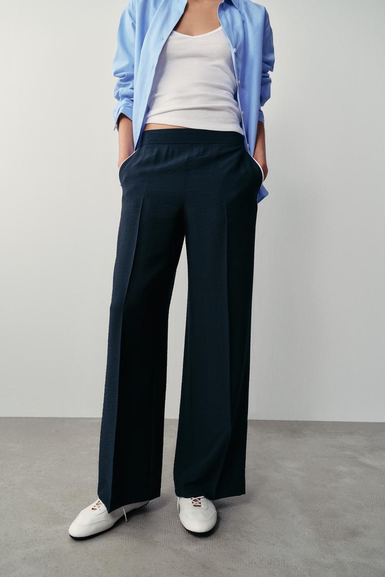 PANTALON À LISERÉS CONTRASTÉS