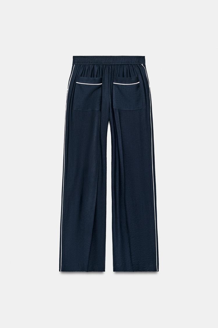 PANTALON À LISERÉS CONTRASTÉS