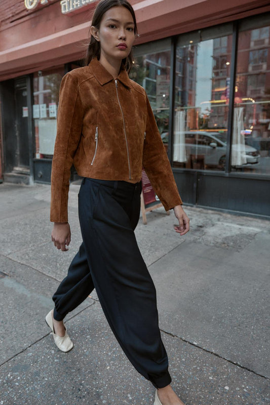 PANTALON À PINCES BAS BOUTON