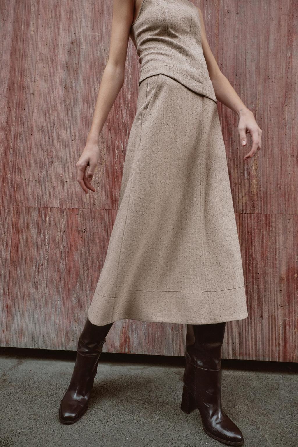 TOP SANS MANCHES À COL MONTANT