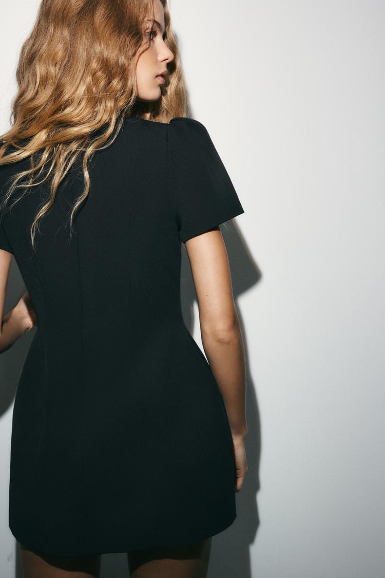 ROBE COURTE PLIS ET POCHES
