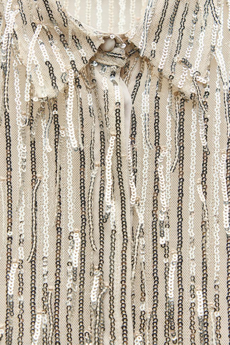 CHEMISE À FRANGES ET SEQUINS