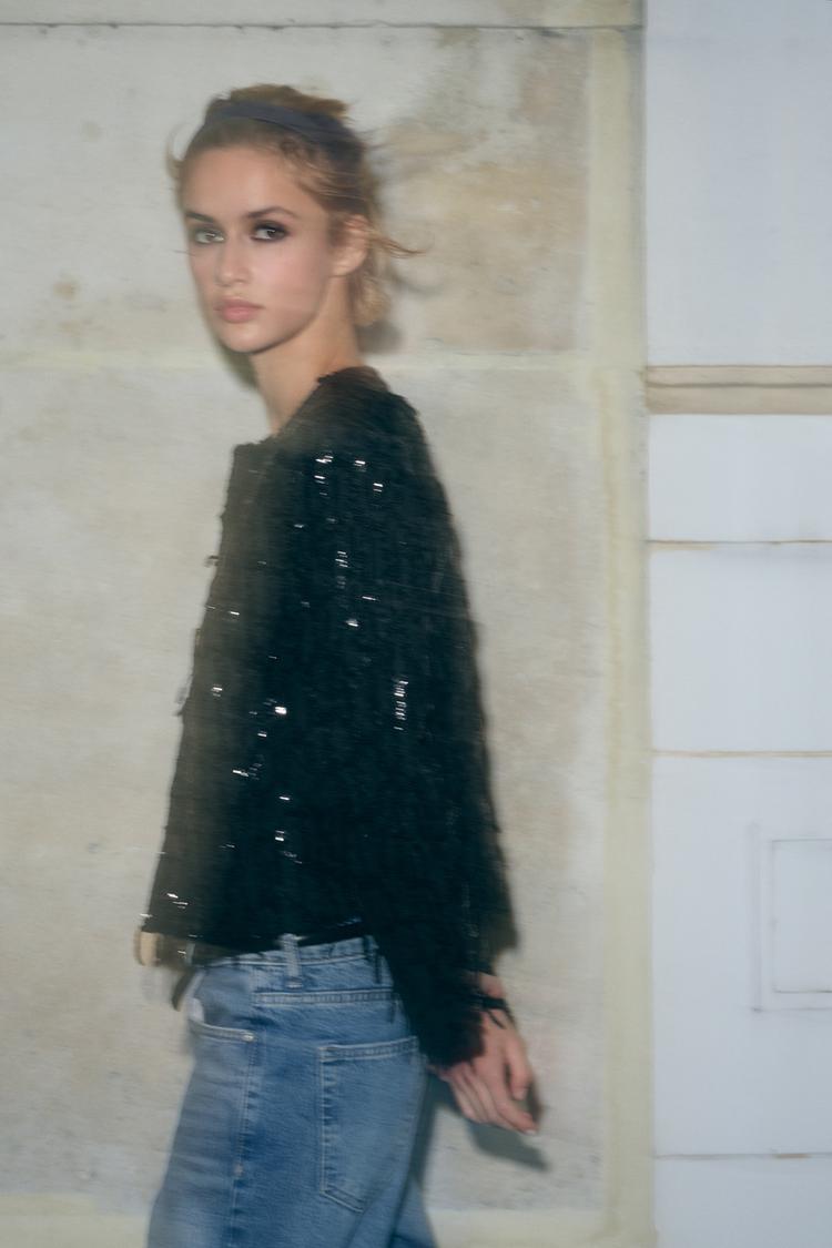 VESTE À FRANGES ET SEQUINS