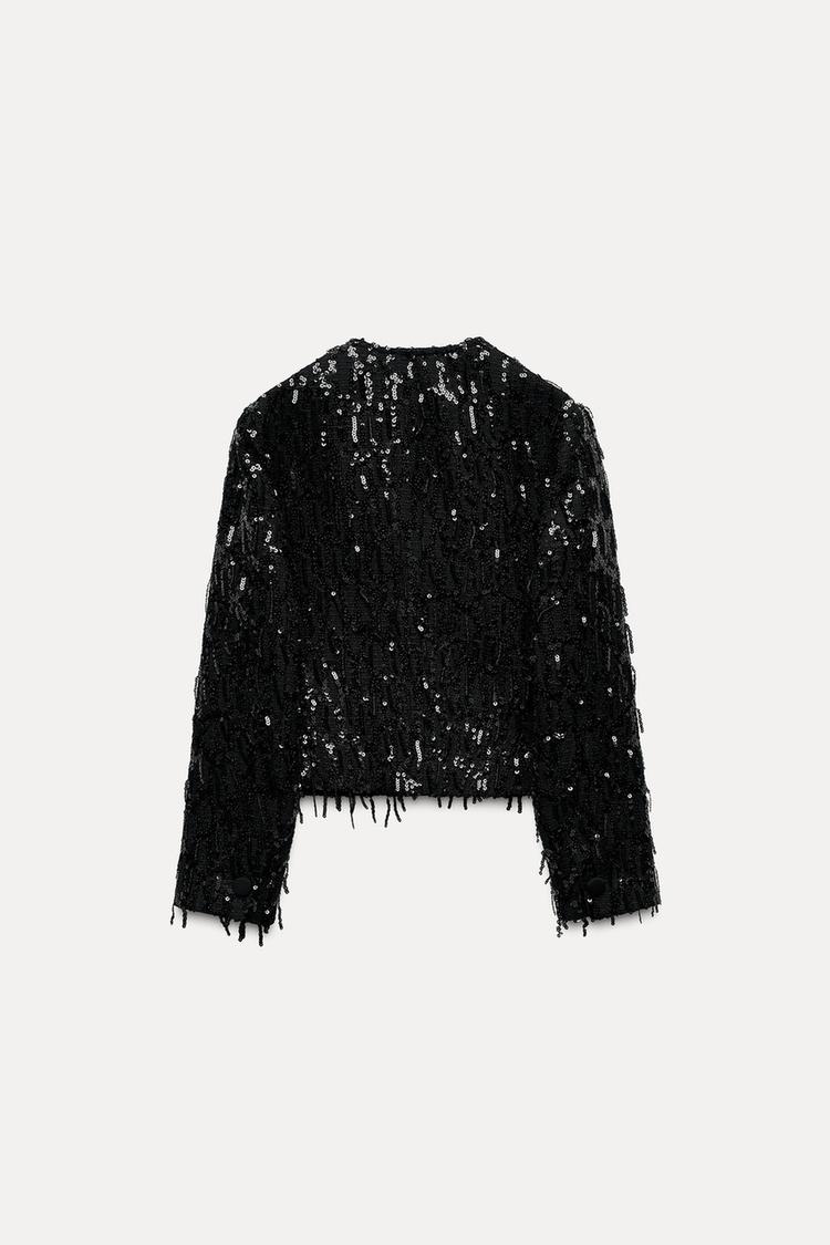 VESTE À FRANGES ET SEQUINS