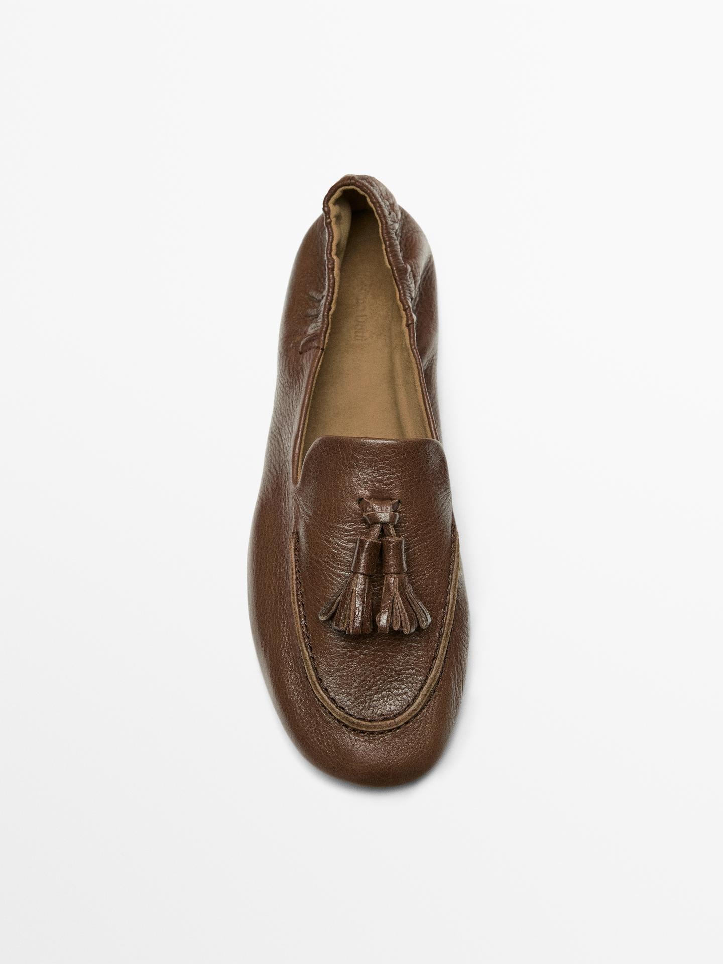 MOCASSINS EN CUIR À POMPONS