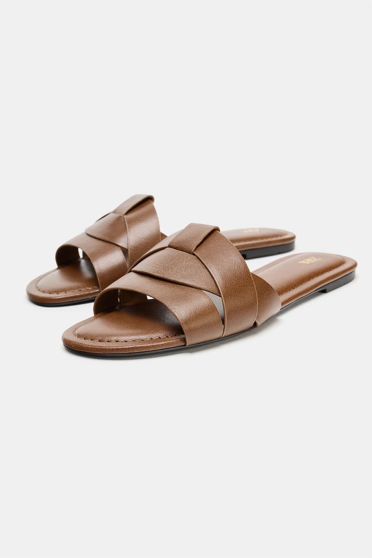 SANDALES PLATES EN CUIR CROISÉES