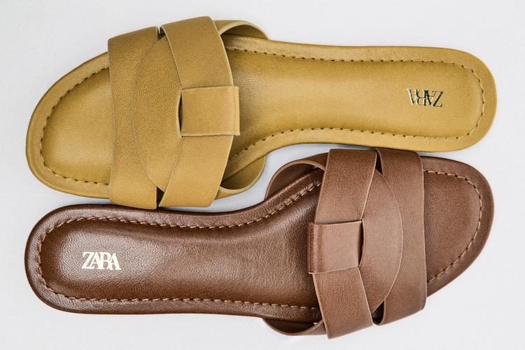 SANDALES PLATES EN CUIR CROISÉES