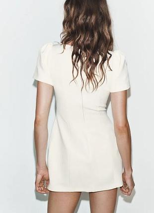 ROBE COURTE PLIS POCHE