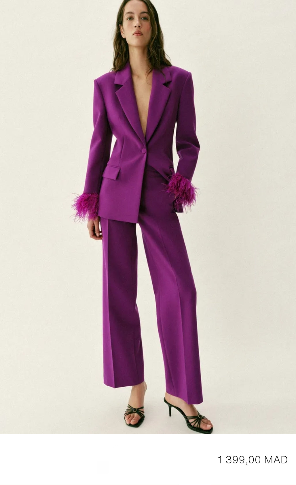 VESTE À ÉPAULETTES ET MANCHETTES EN PLUMES