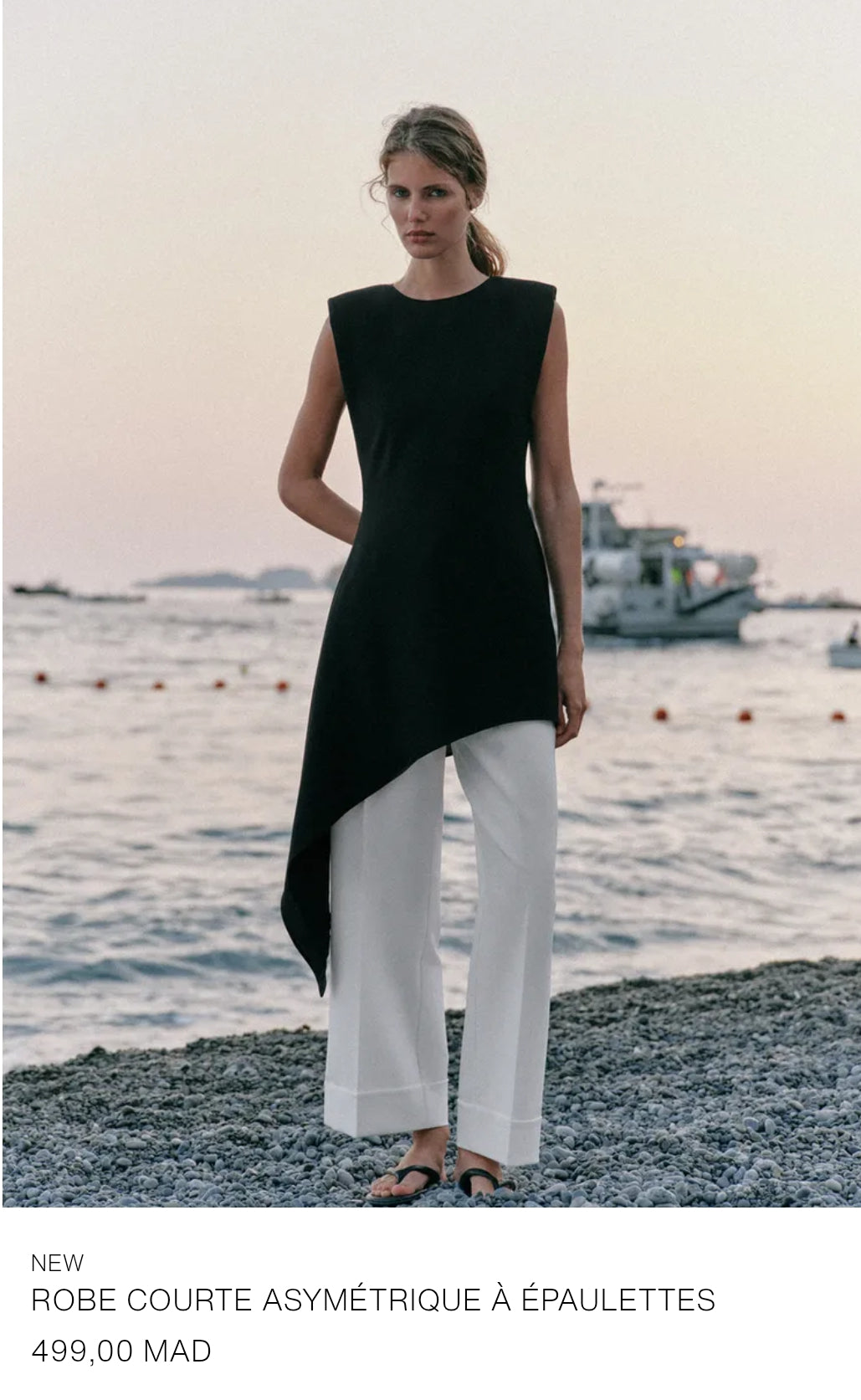 ROBE COURTE À BAS ASYMÉTRIQUE